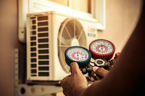 Professional Heat Pump Repair technician working in Greenwood, MO